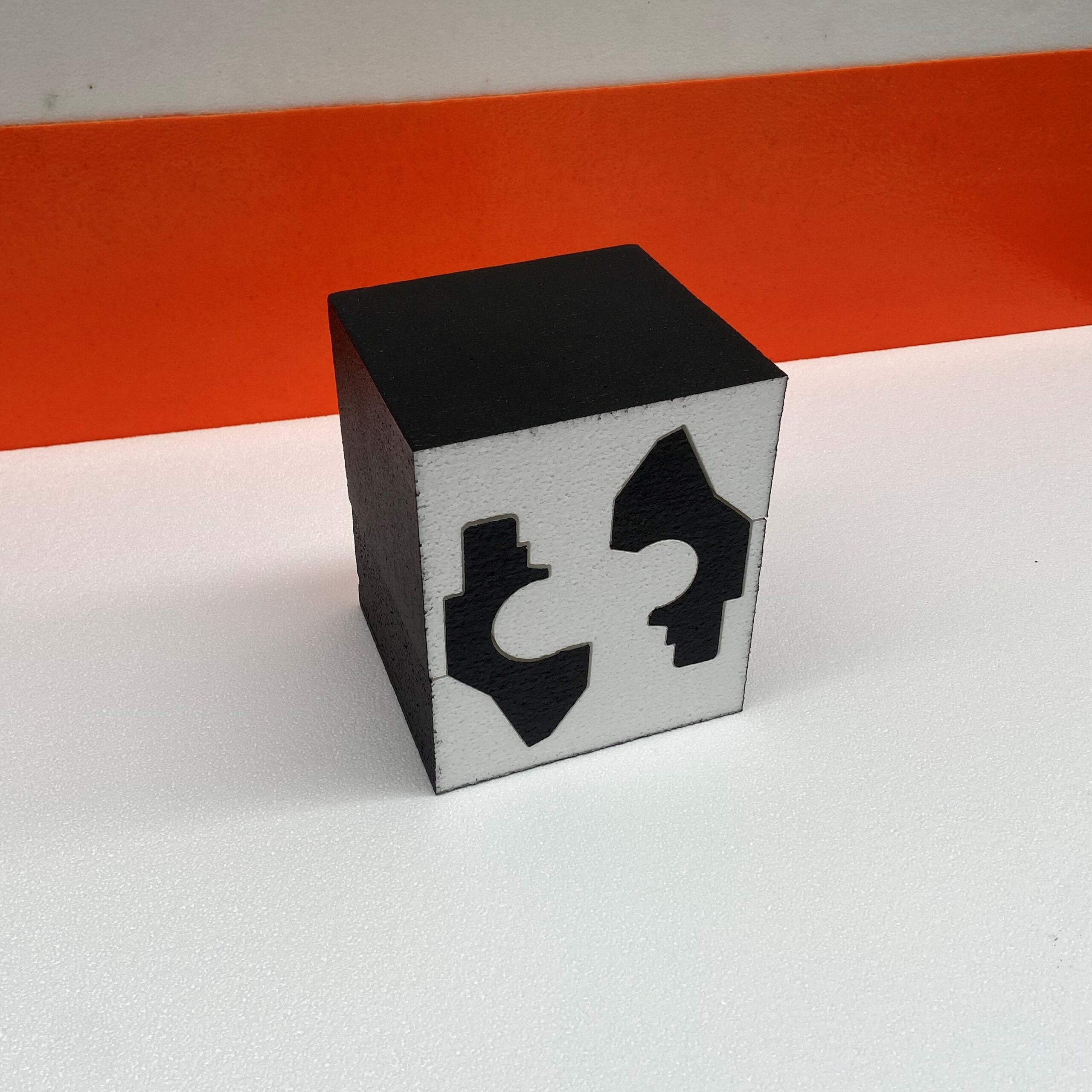 black grey box with openings 